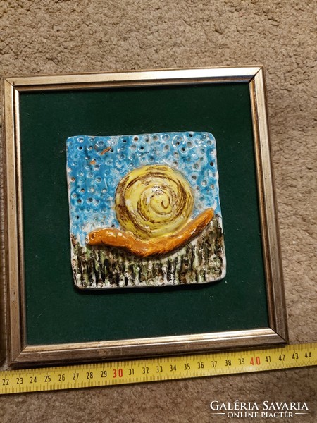 Two ceramic reliefs, in a frame, size indicated!