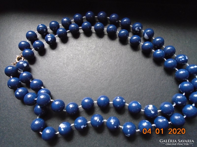 Necklace made of blue pearls with gold-plated clasp