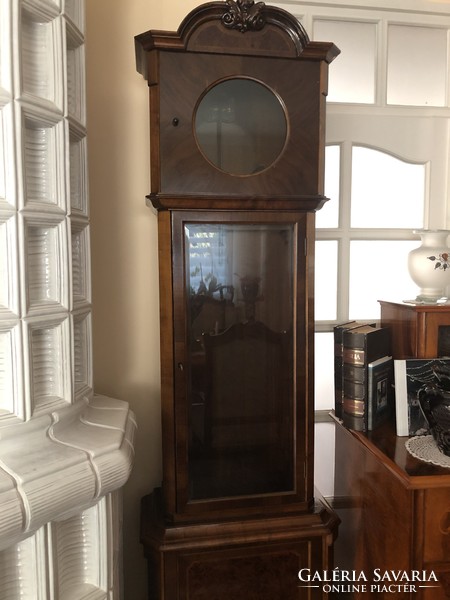 Antique two-weight standing clock.