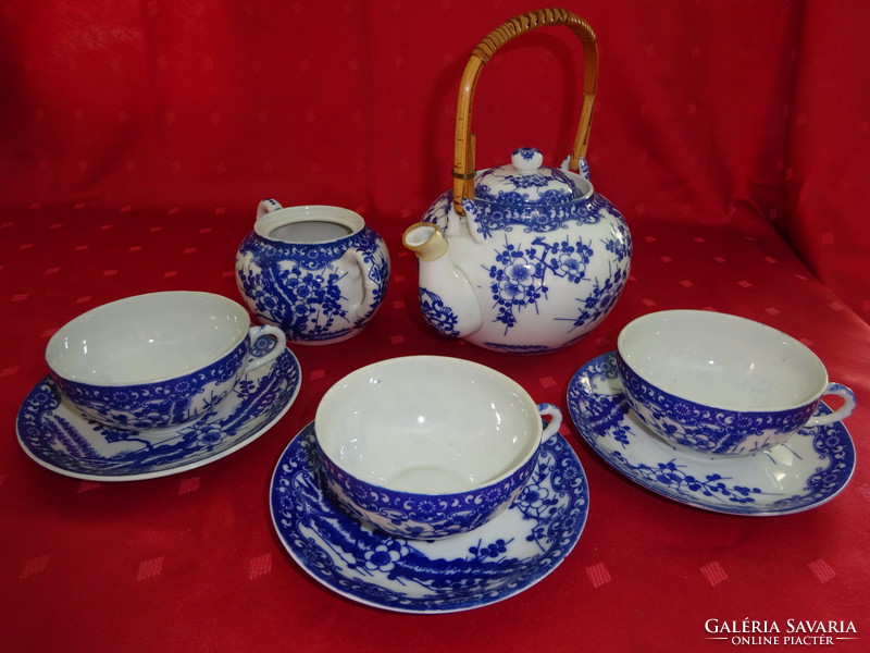 Japanese porcelain tea set for three people with a blue pattern. He has!