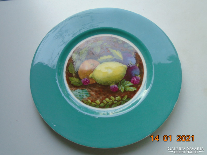 19 Sz signed, painted underglaze with a still life as a turquoise wall plate, intaglio marked