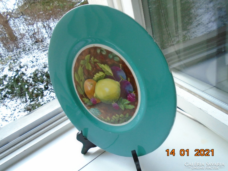 19 Sz signed, painted underglaze with a still life as a turquoise wall plate, intaglio marked
