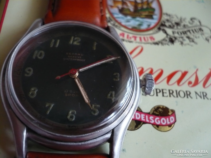 Record is a very rare and beautiful Swiss watch from the 1950s