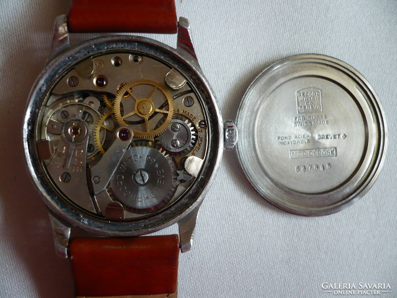 Record is a very rare and beautiful Swiss watch from the 1950s