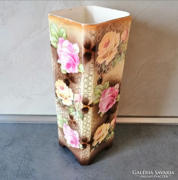 Antique faience log vase with roses