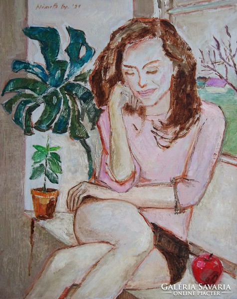 Woman in front of window