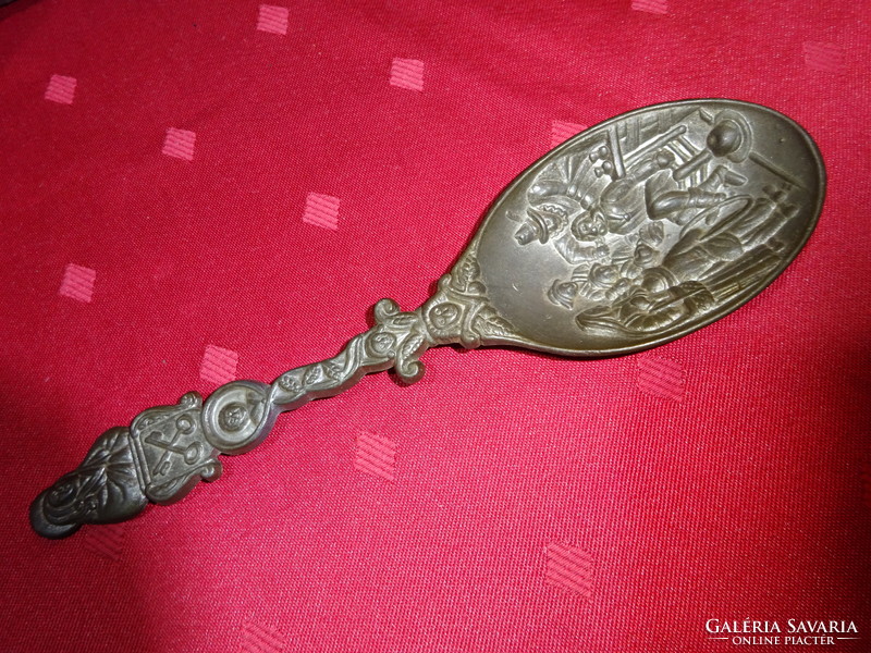 German embossed tin spoon (six pieces) with wooden wall bracket. He has!