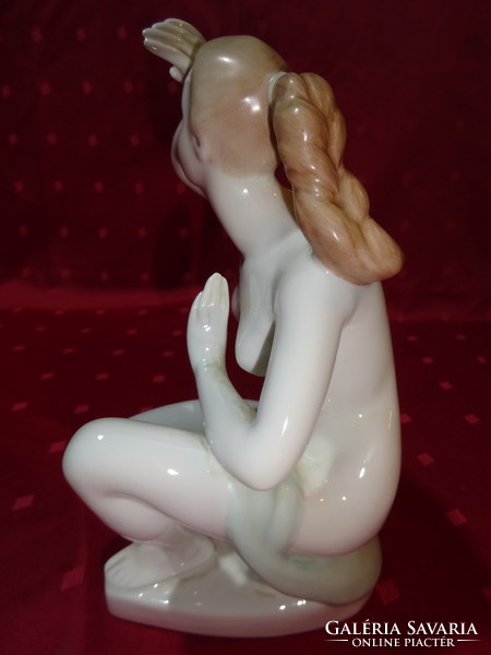 Aquincum porcelain figural sculpture. Female nude with braided hair looking into the distance. He has!