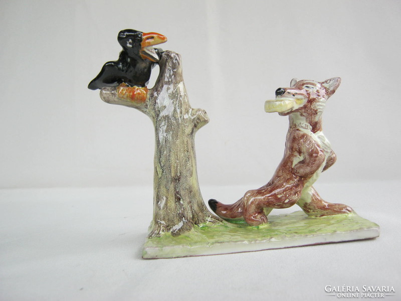 Ceramic figure of a raven and a fox