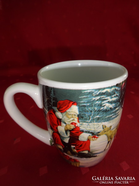 German porcelain Christmas mug with Santa Claus and deer pattern. He has!
