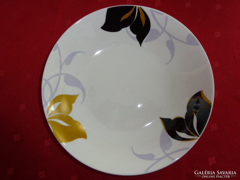 German porcelain deep plate, diameter 20 cm, height 4 cm. With black / gold flowers. He has!