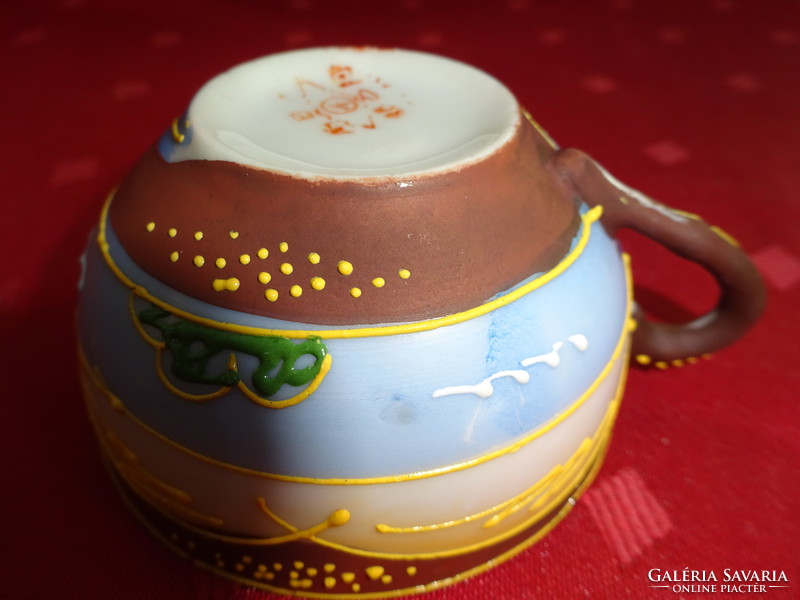Japanese porcelain coffee cup, diameter 7 cm. He has!