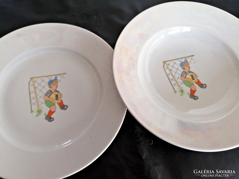 Pair of Zsolnay soccer goalie story plates