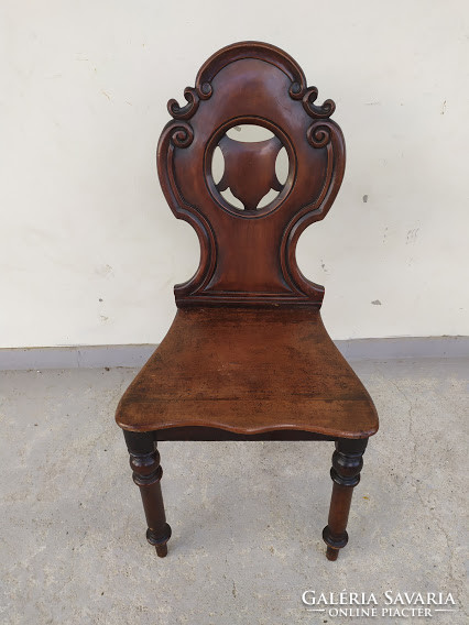 Antique patinated hardwood renaissance carved chair