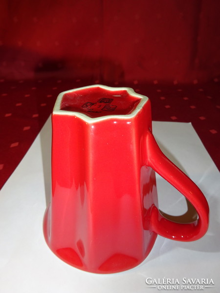 Hexagonal porcelain red mug, white inside, height 10 cm. He has!