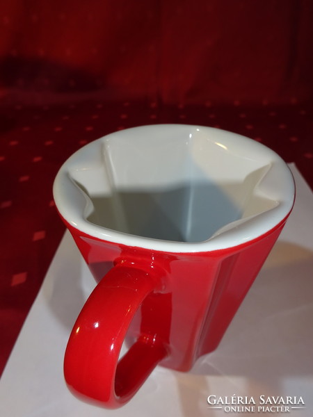 Hexagonal porcelain red mug, white inside, height 10 cm. He has!