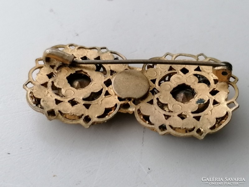 Old brooch with badge