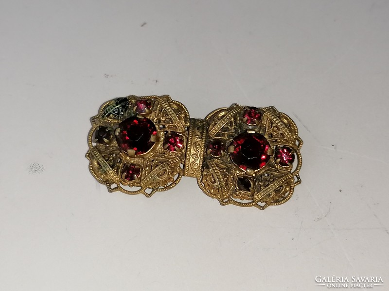 Old brooch with badge