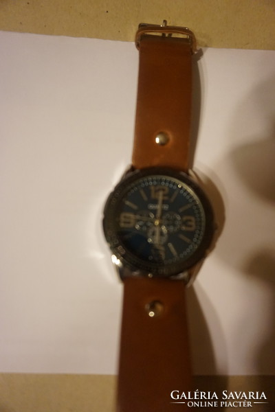Avon sold quarz men's watch with armband for sale at reasonable price