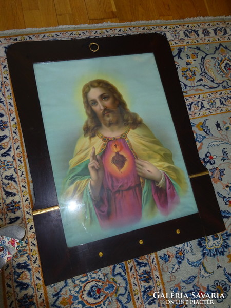 More than 100 years old wooden picture frame with original picture. Size 90 x 70 cm. He has!