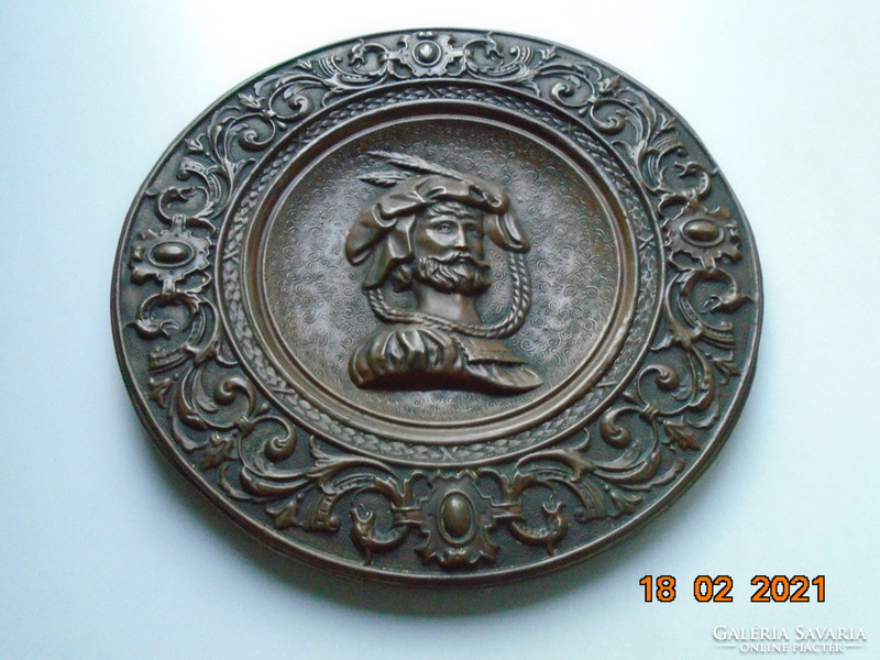 Antique renaissance man with portrait, historic edging patterns, wall plate