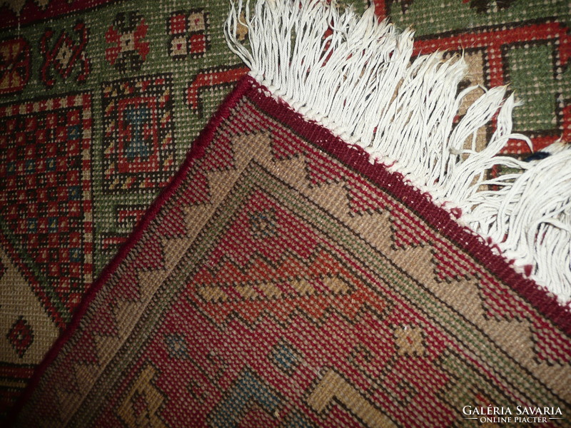 Antique Békészentandra hand knot with Caucasian pattern. Wool rug in very good condition, approx. 1940-50