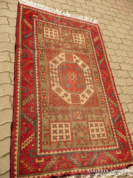 Antique Békészentandra hand knot with Caucasian pattern. Wool rug in very good condition, approx. 1940-50