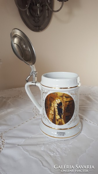 Large porcelain jug with a tin lid