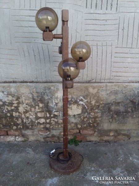 Floor lamp with spherical bulbs on a wooden base