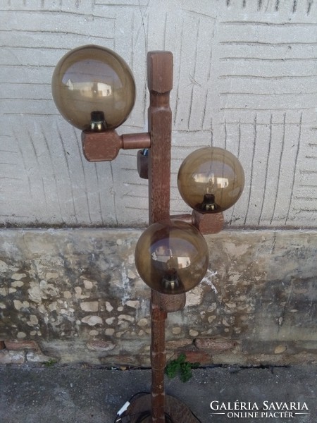 Floor lamp with spherical bulbs on a wooden base