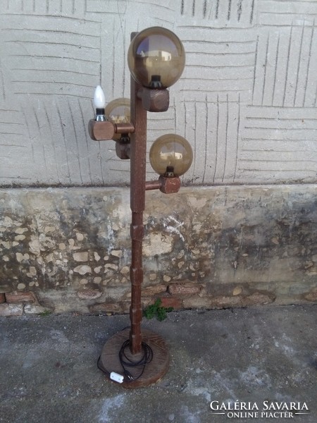 Floor lamp with spherical bulbs on a wooden base