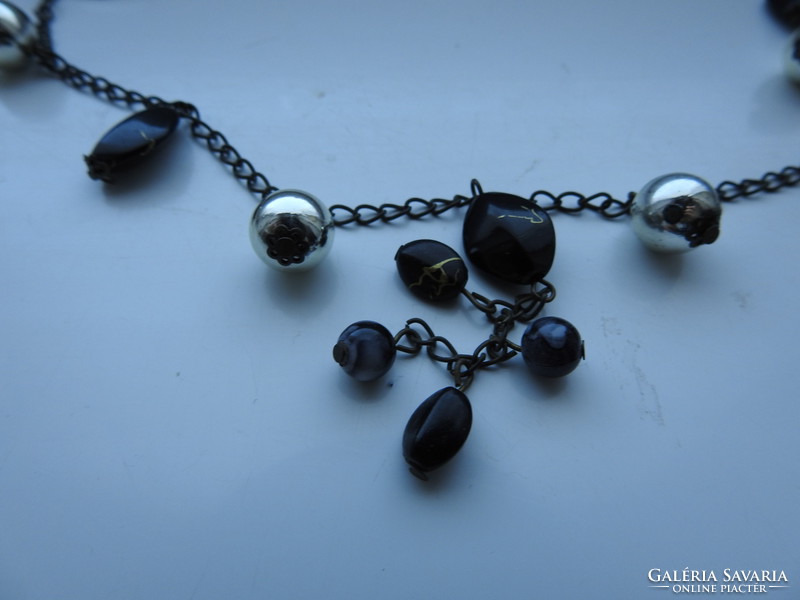 Neck with blue pendants