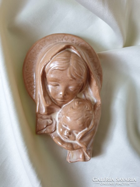 Antique wall ceramic mother with child