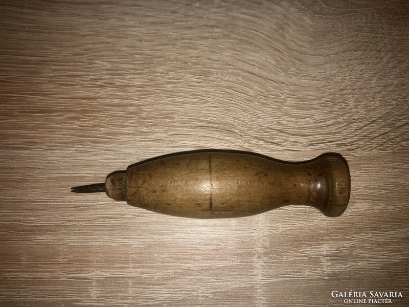 Price with old wooden handle