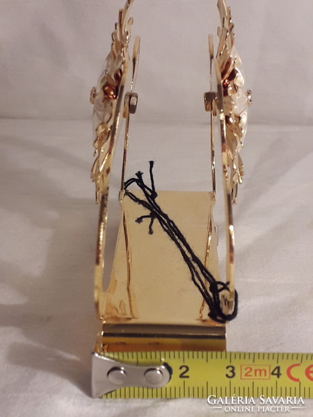 Gold color or gilded napkin holder with swarovski crystal middle ornament in new condition