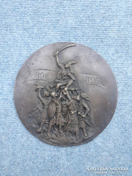 Millennium bronze relief.