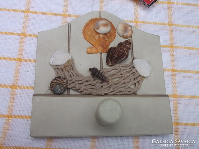 Wall hanger decorated with shells anywhere