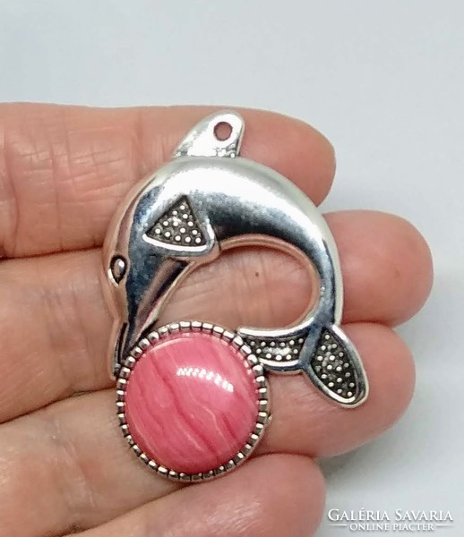 Natural rhodochrosite pendant in a Tibetan silver dolphin socket