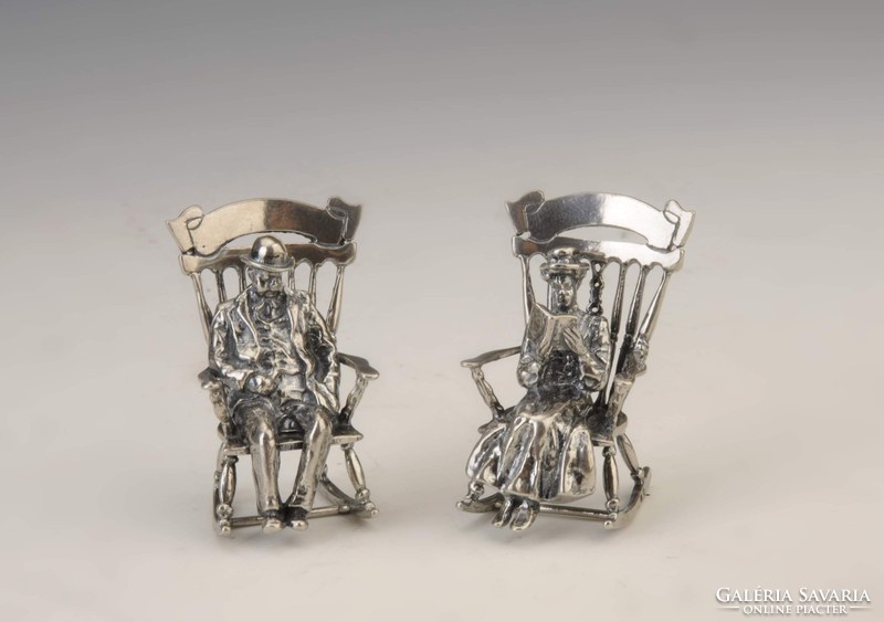 Pair of silver miniature rocking chairs