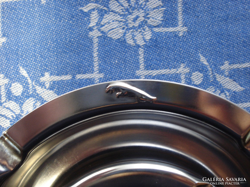 Chromed steel ashtray with jaguar pattern