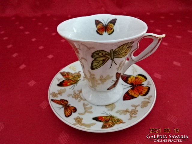 German porcelain, butterfly pattern coffee cup + placemat. He has!