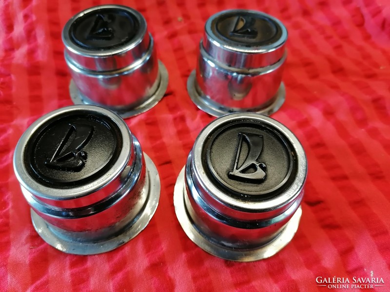 4 Lada wheel caps for sale.