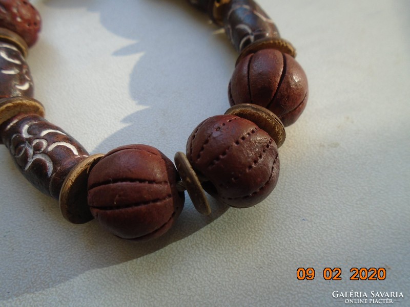 Unique handmade necklace made of several exotic wooden pearls