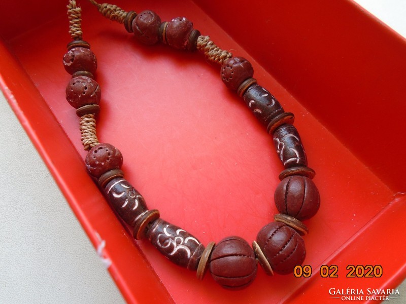Unique handmade necklace made of several exotic wooden pearls