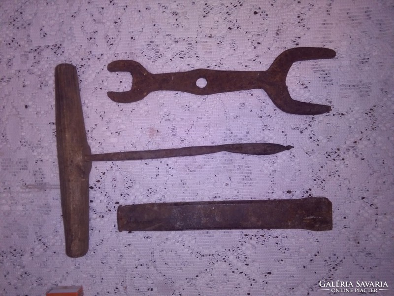 Old wrought iron hand tool - three pieces together - chisel, key, drill
