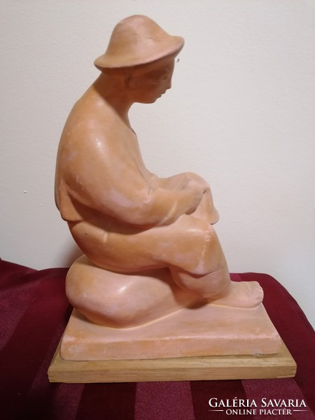 Béla Kucs terracotta sculpture of a man holding a bowl