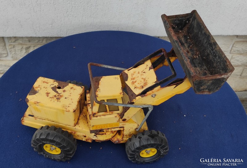 Large plate, iron tonka marked, grapple, tractor as shown in the photos, machine