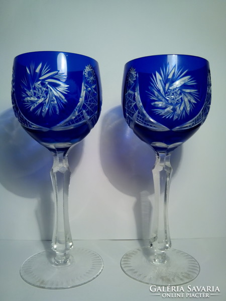 One drop in a pair of polished glasses with crystal bases was damaged