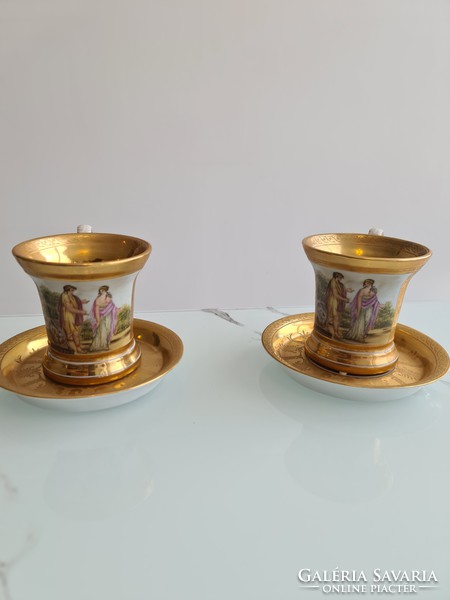 A sumptuous pair of 18th-19th century gilded tea and coffee cups