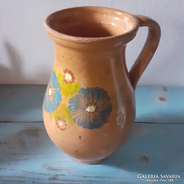 Beautiful old folk ceramics are for sale together. Rustic decoration.